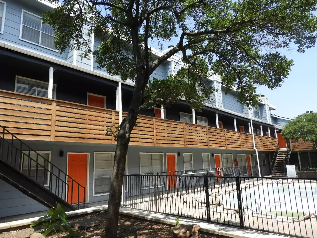 Multifamily building with new wood balcony screening