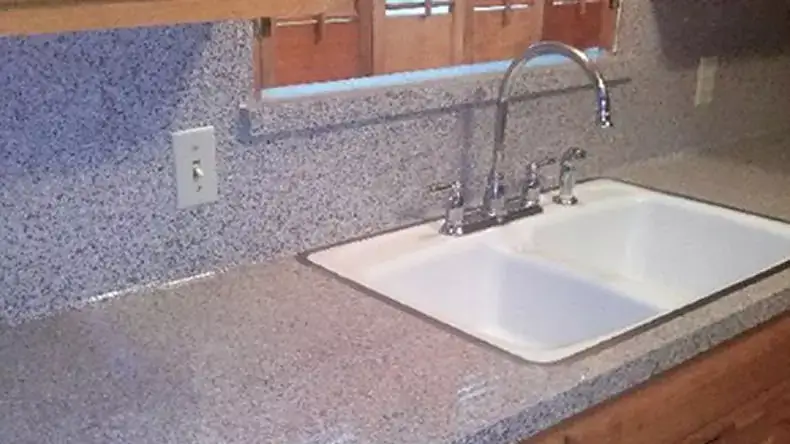 Renovated countertop and sink in an apartment interior