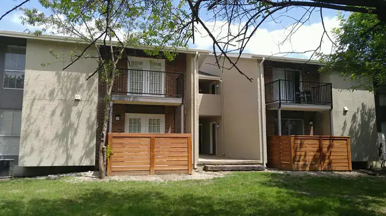 Exterior construction work at a multifamily property